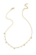 Necklace with alternating balls