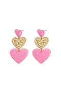Statement earrings with glitter hearts